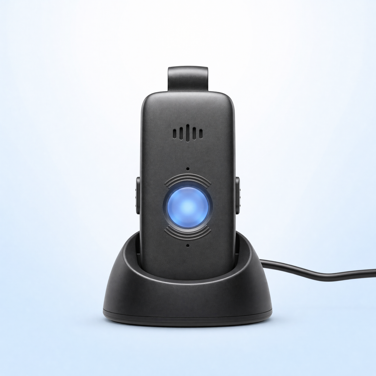Care Alert medical alert pendant resting upright in its black charging dock, blue help button illuminated, on a light blue background.